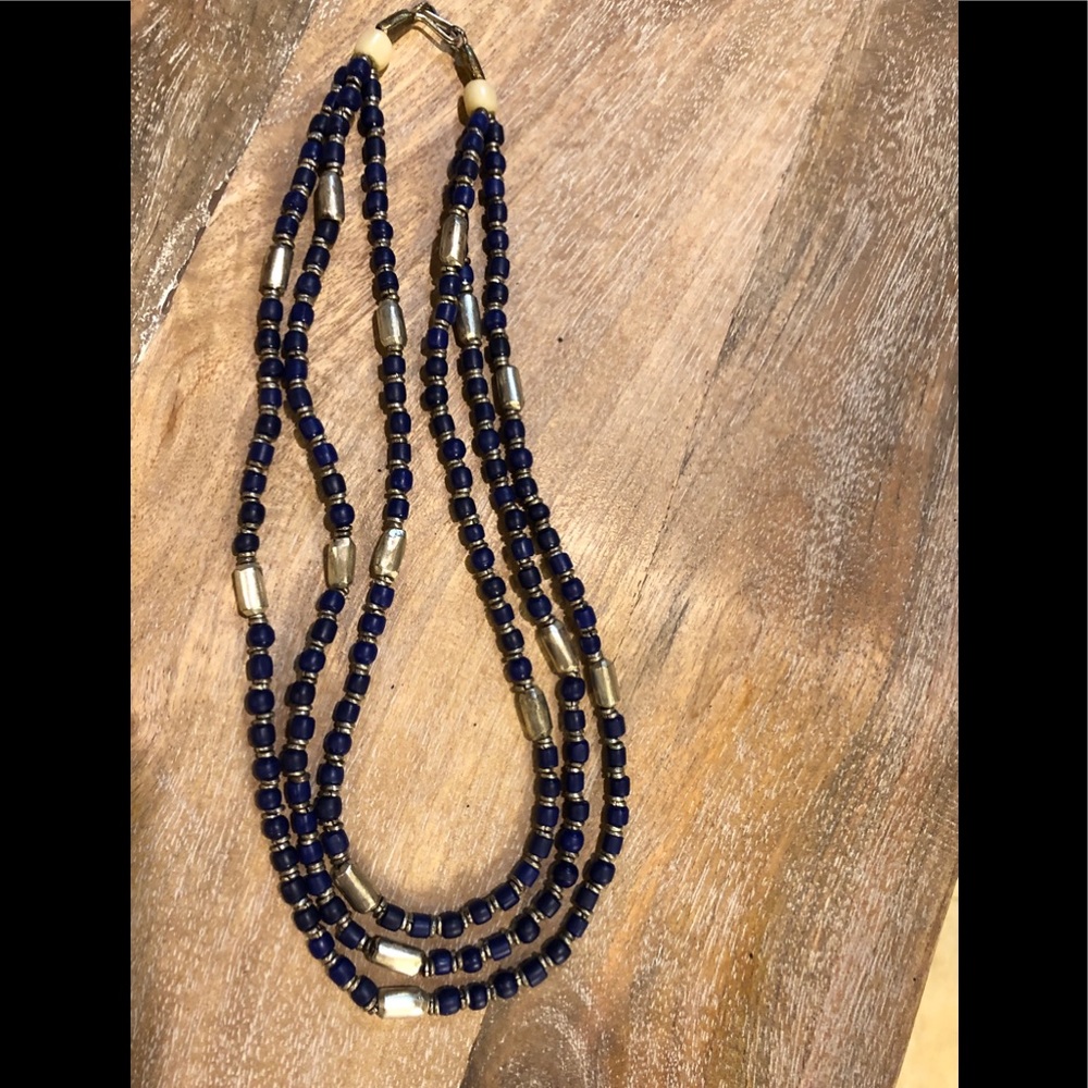Silver metal beads and blue onyx beaded necklace.
